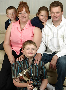 Happy family ... with mum Debbie, her partner John and brother and sister Patrick and Sophie